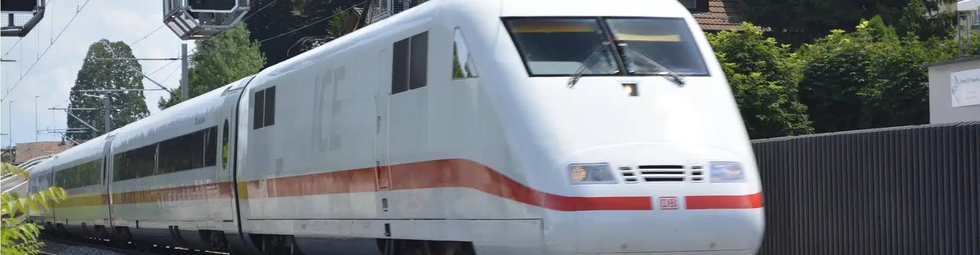 a white train with red stripe
